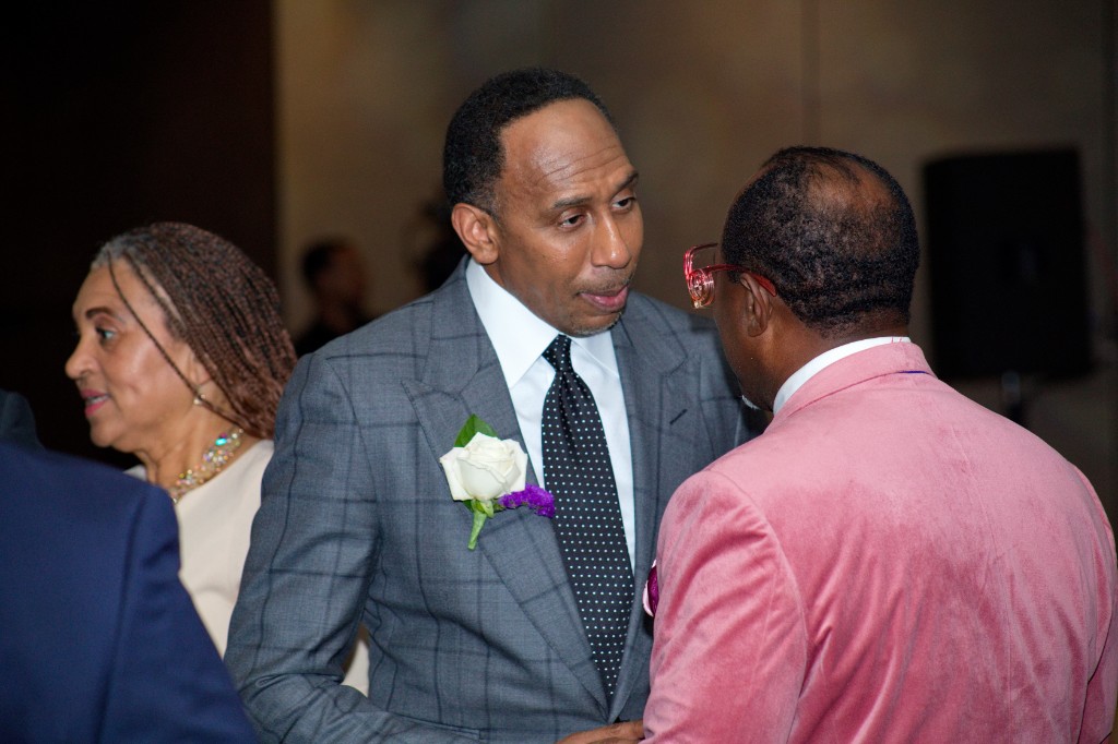 Stephen A. Smith speaking with a guest at Hall of Fame Weekend