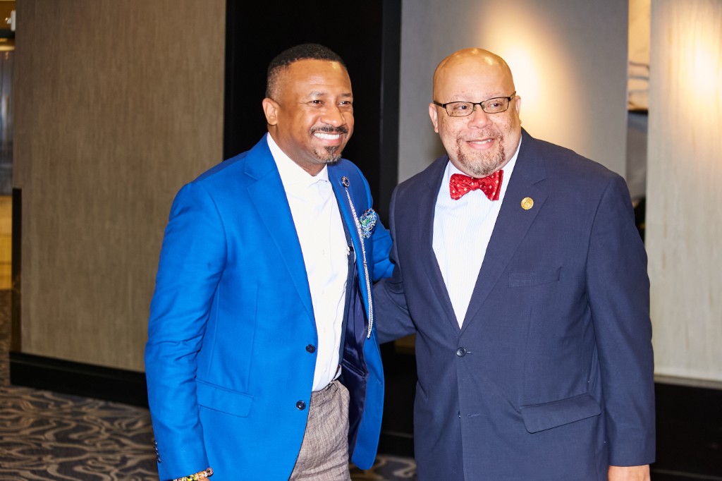 Two guests posing together at a Foundation event