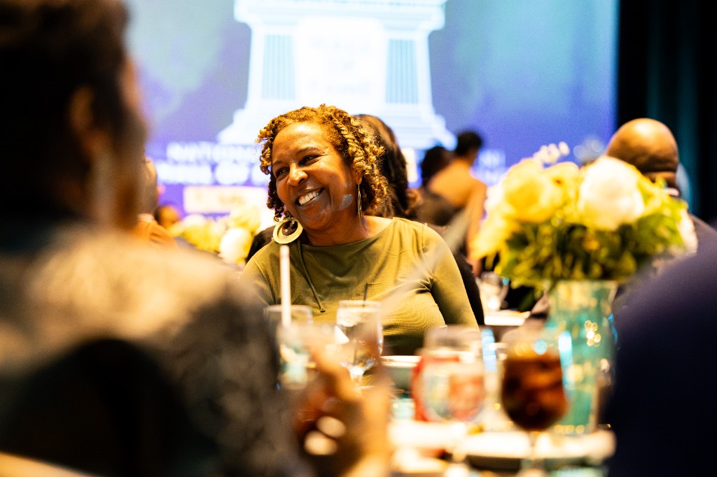 A guest at a Hall of Fame Weekend banquet table