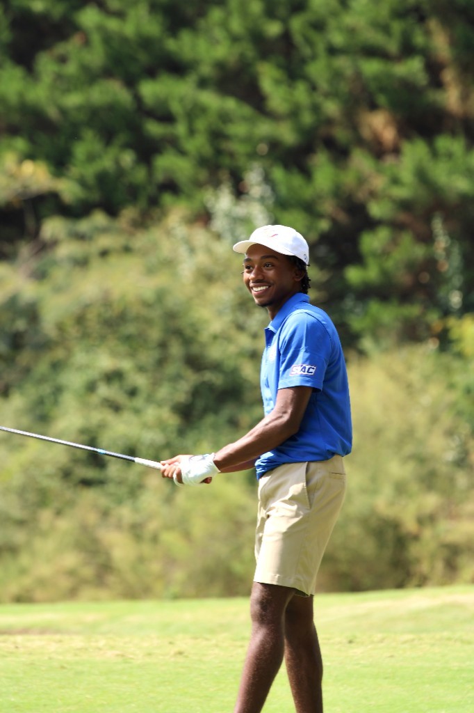 HBCU golfer smiling on the course